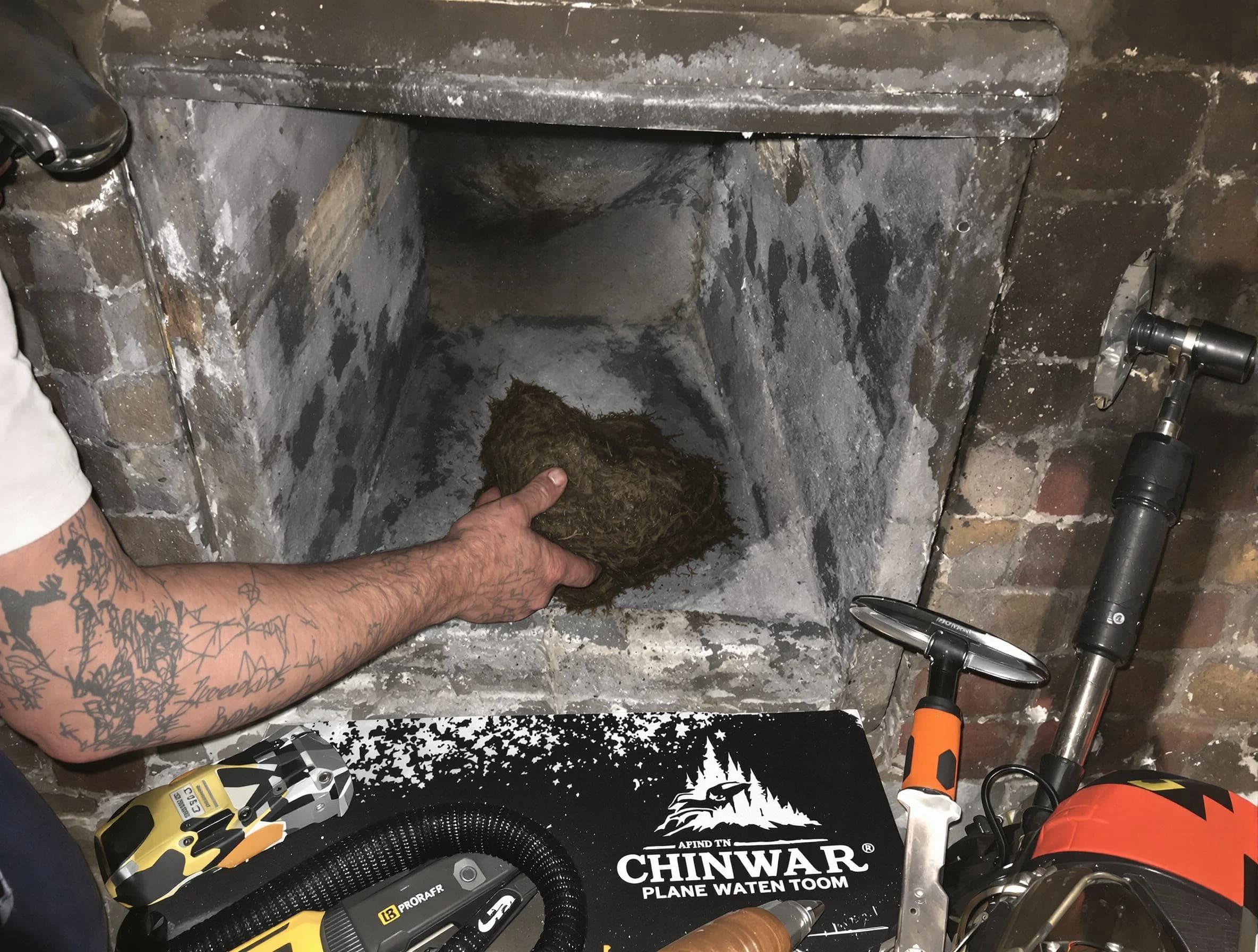 Four Square Mile Chimney Sweep safely removing debris and screening chimney in Four Square Mile, CO